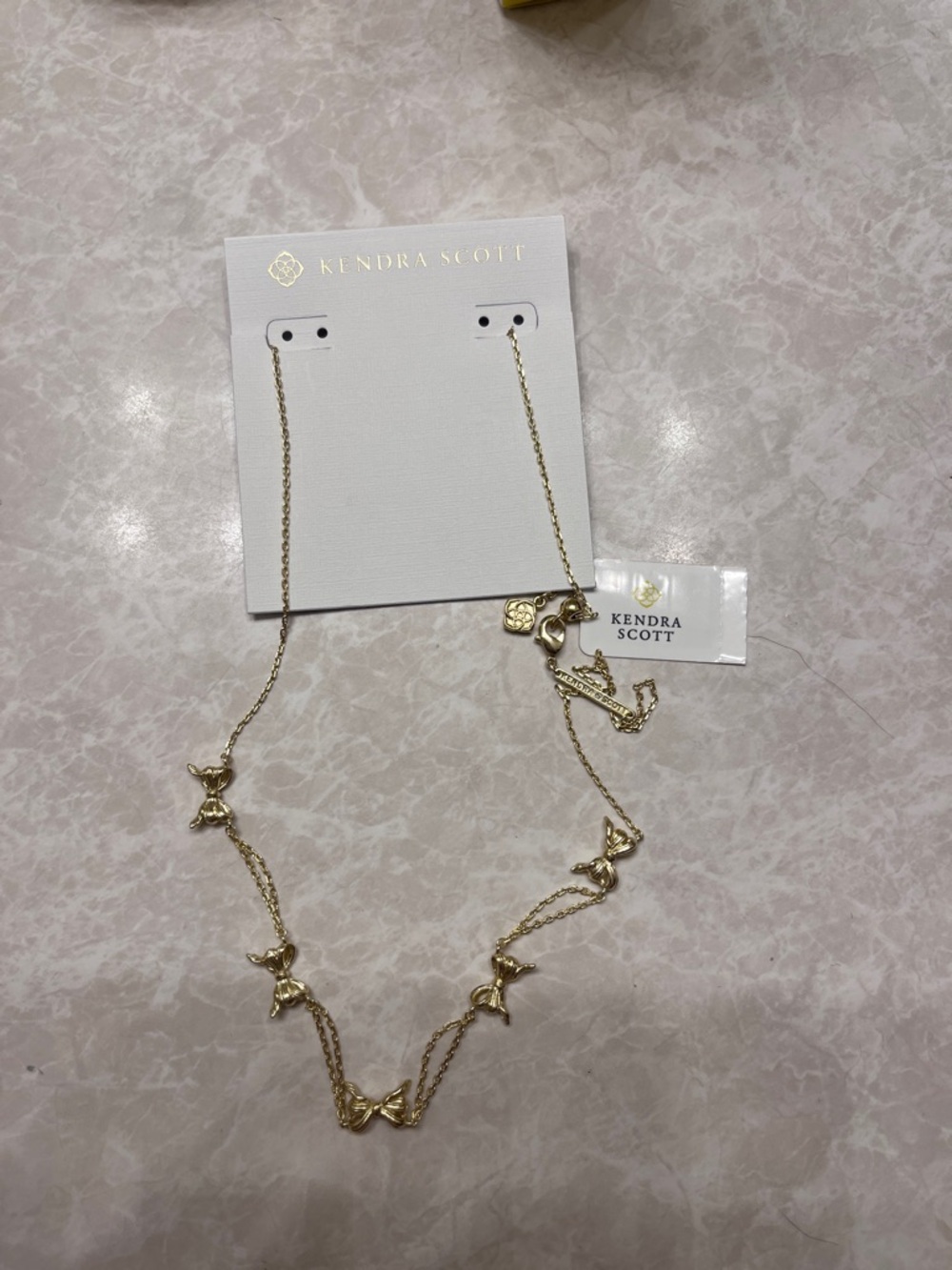 New in Box Kendra Scott Bow Gold Strand Necklace - Picture 4 of 5